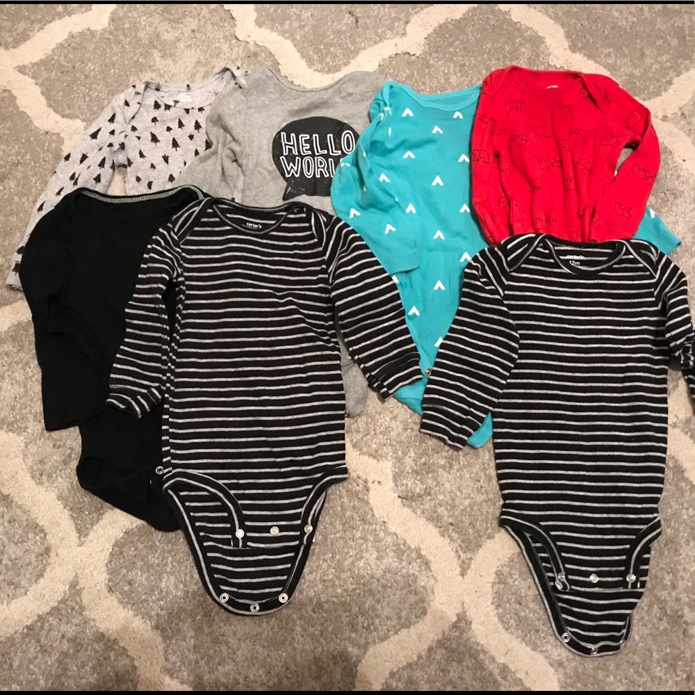 Various sized 12 months onesies